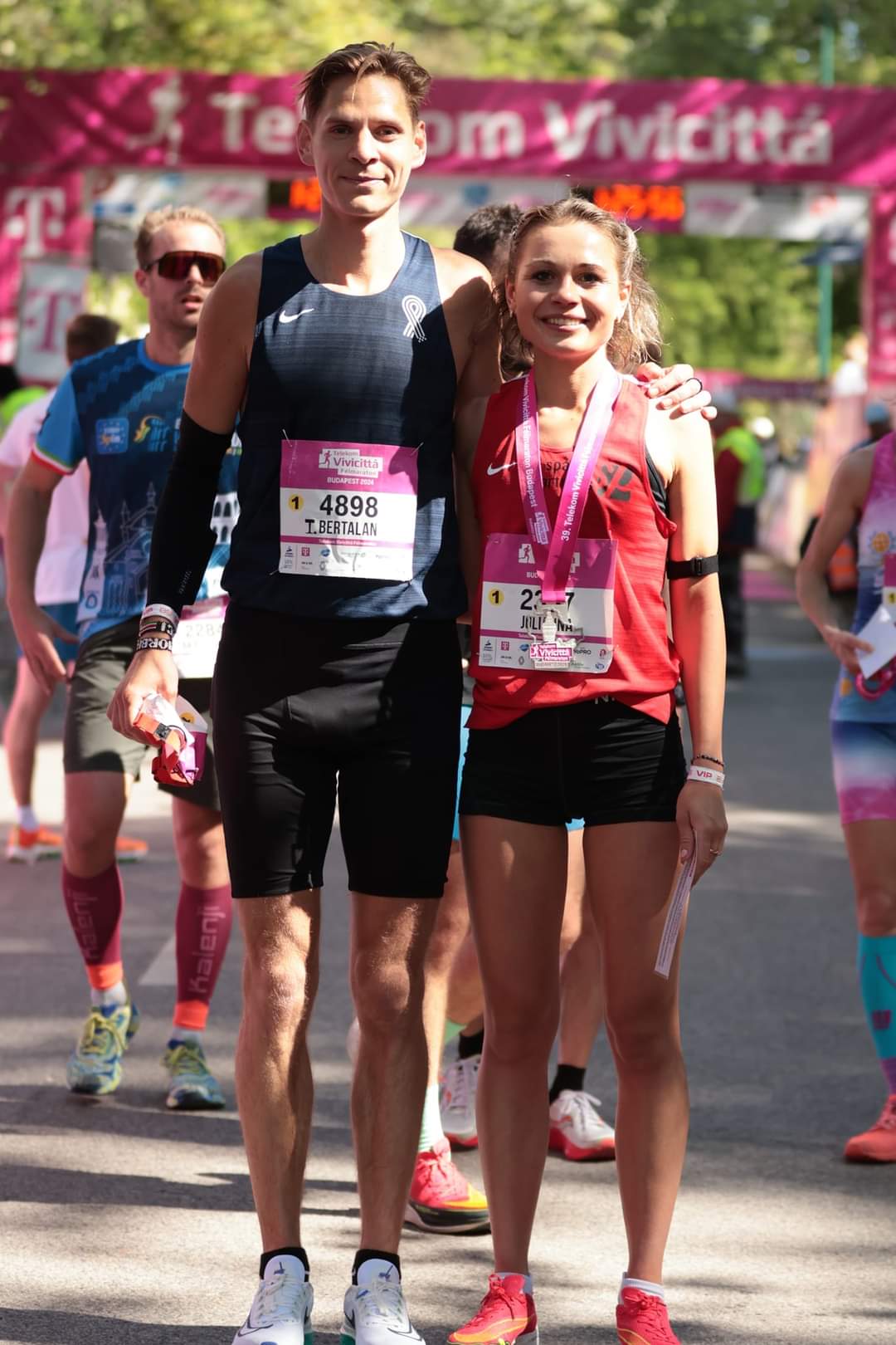 Julienn and Berci at the finish line of the Telekom Vivicitta half marathon in Budapest